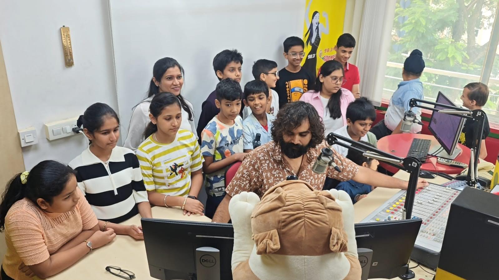 Tutor encouraging and guiding students in class